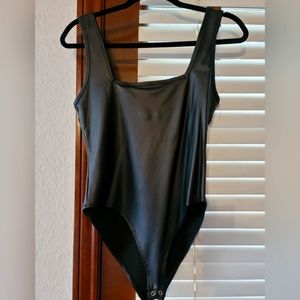 Leather new with tags, black body suit